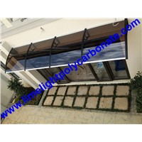 door entrance awning canopy with black bracket and bronze polycarbonate solid sheet