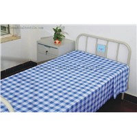checked hospital bed linen