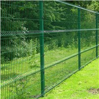 Green wire netting fence at residential