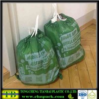green trash bag with drawstring