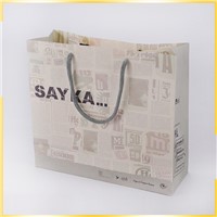 Recyclable Newspaper Style Shopping Packaging Customized Craft Paper Bag for Wholesale