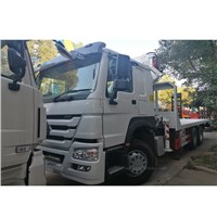 Sinotruck Howo 290hp 12 Tyre Flatbed Truck for Load 24 Tons Machinery with CLW Brand 12ton Fold Crane