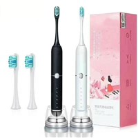 Factory Direct Supply Wireless Charging Electric Toothbrush for Business Trip with 2 Brush Heads